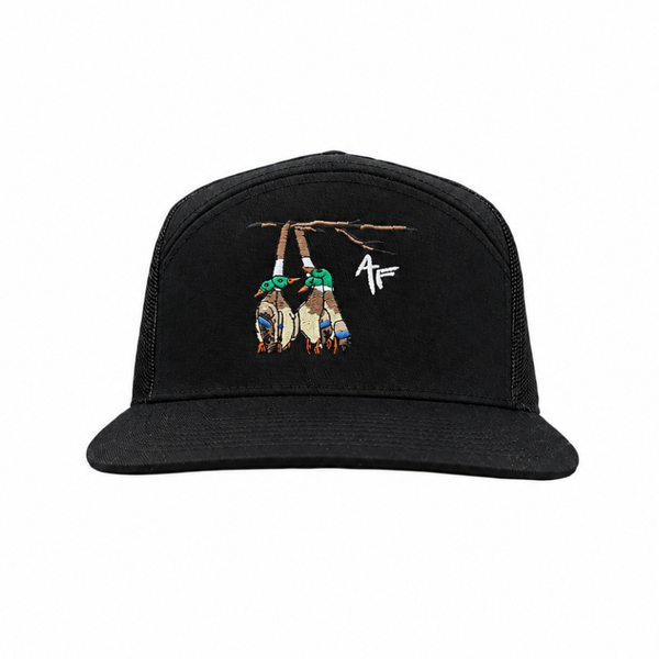 A black trucker-style cap with a front graphic depicting two hanging ducks wearing green hats and a white stylized '4F' logo on the side, shown against a plain white background.