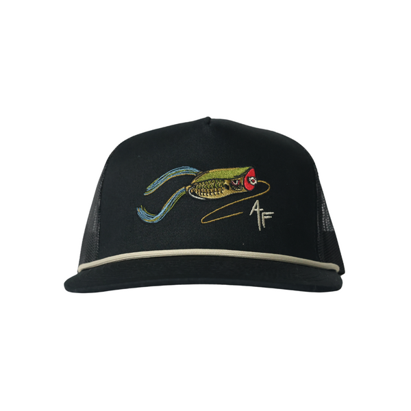 Black cap with frog lure design and logo on a white background