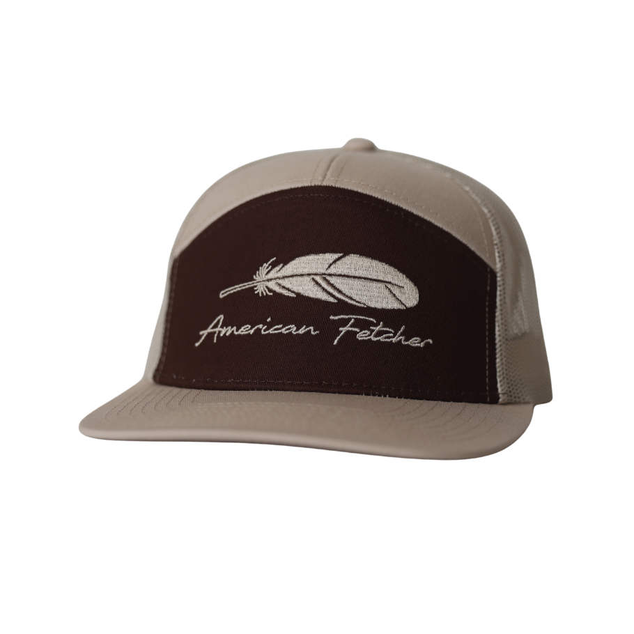 7 panel hat that is brown and khaki with feather design with 'American Fetcher' logo on the front.