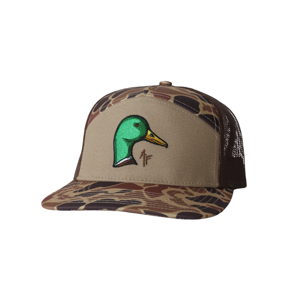 7 panel hat with a mallard duck head design on the front. Hat has brown mesh back and duck camo front look.
