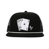 A black trucker-style cap with a white embroidered design on the front depicting four poker cards and a stylized 'AF' monogram, set against a plain white background.