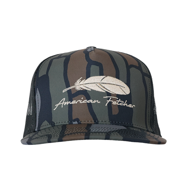 A camouflage trucker hat with a white embroidered feather and 'American Fetcher' script on the front, shown against a plain white background.