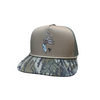 A trucker-style baseball cap with a tan front panel, mesh back, and a camouflage-patterned visor. The front panel features an embroidered deer head with antlers and a small black "AF" logo.